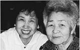 猫塚真里子さんと患者の写真